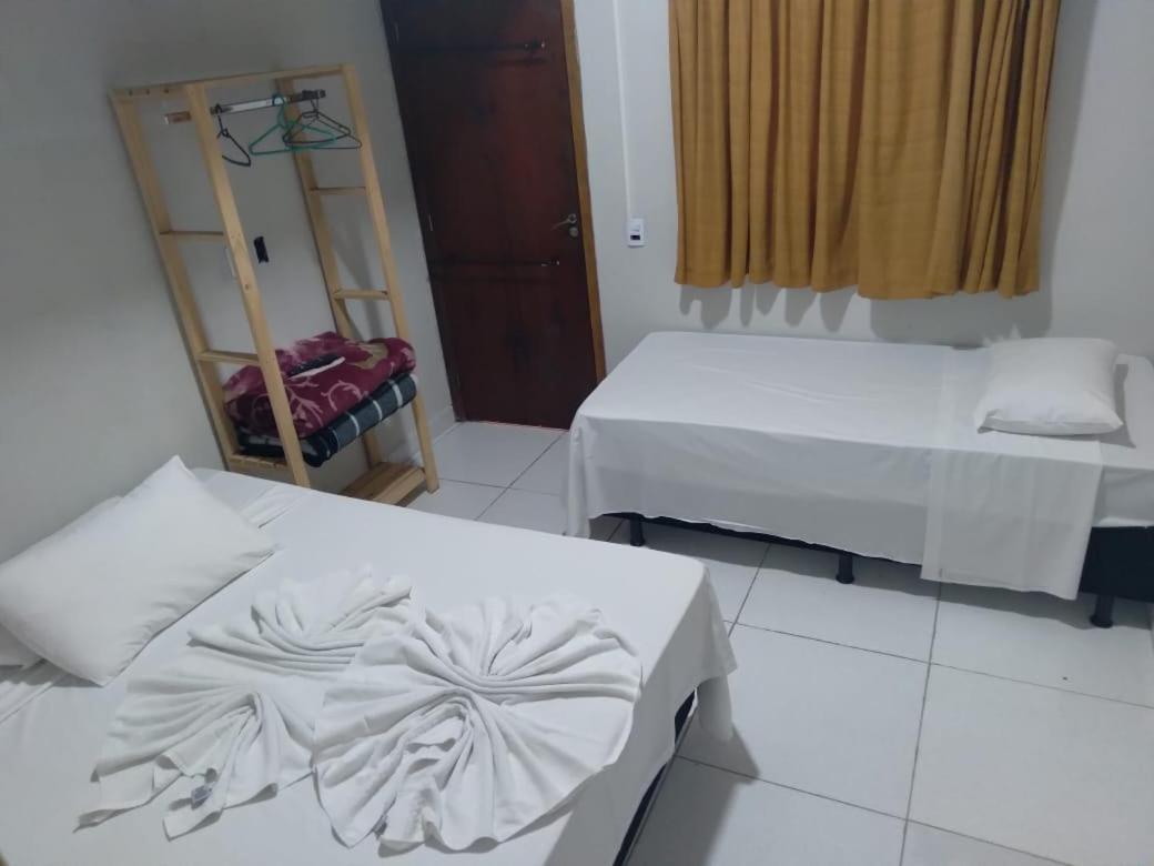 Quarto Triplo com Banheiro Privativo