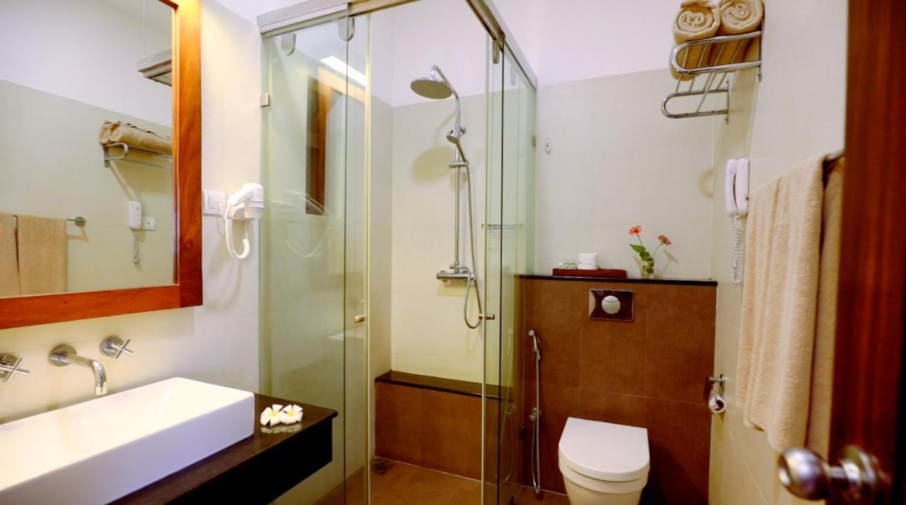 Suite a glass of traditional lassi overlooking paddy fields enjoy tea or coffee evening snacks