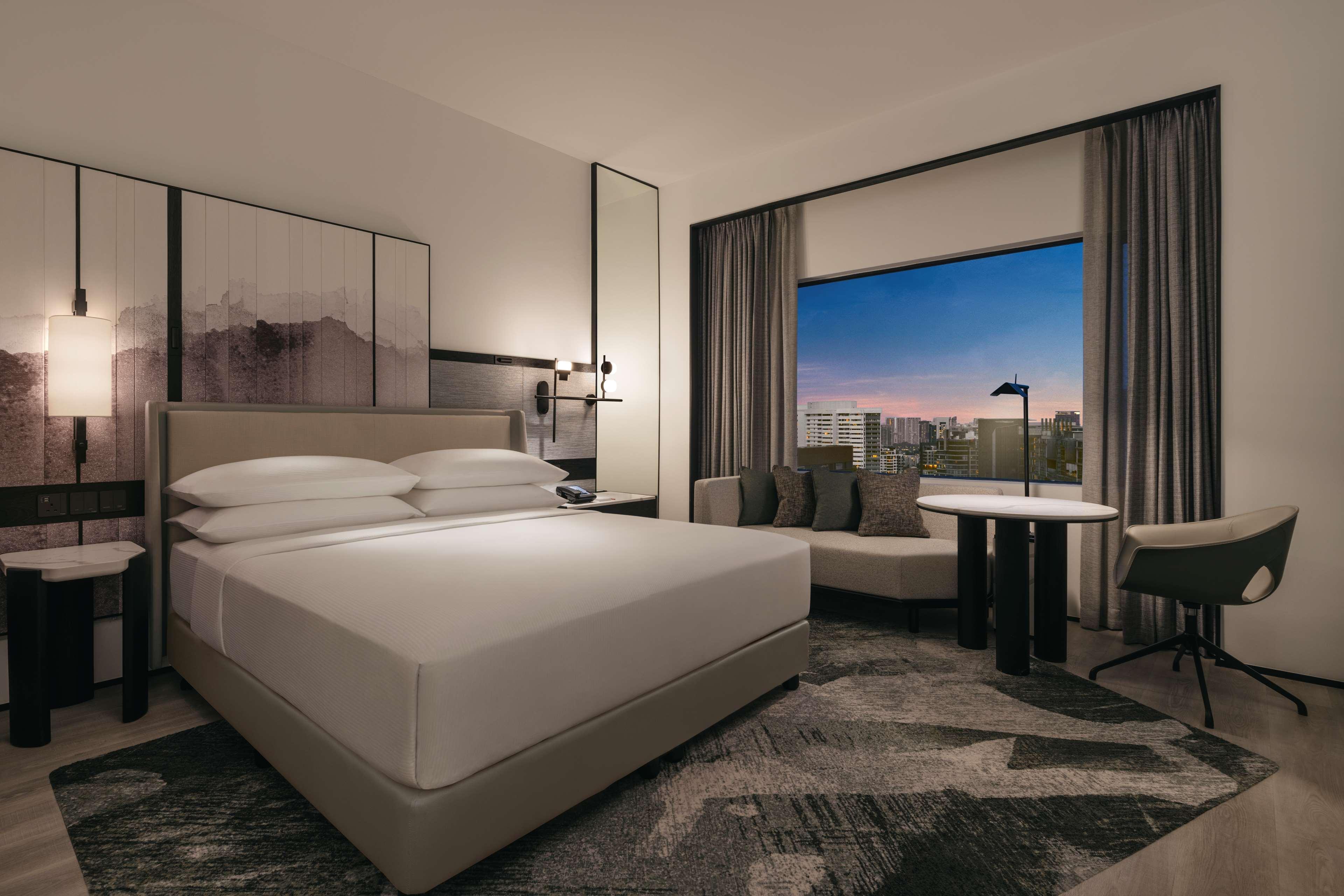 Habitación Executive con acceso al salón y cama extragrande