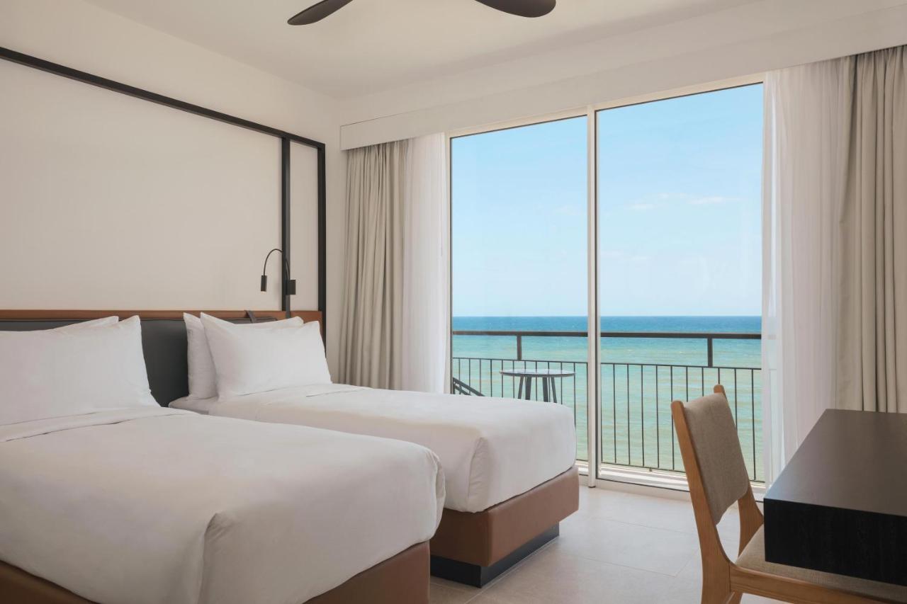 Deluxe Tweepersoonskamer met 2 Aparte Bedden en Uitzicht op Zee