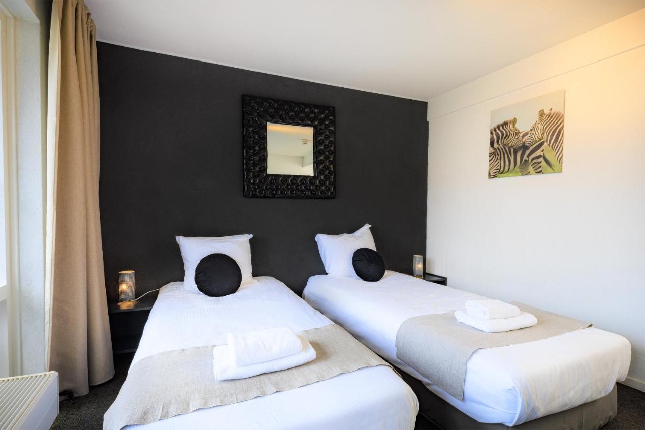 Tweepersoonskamer met 2 Aparte Bedden en Balkon