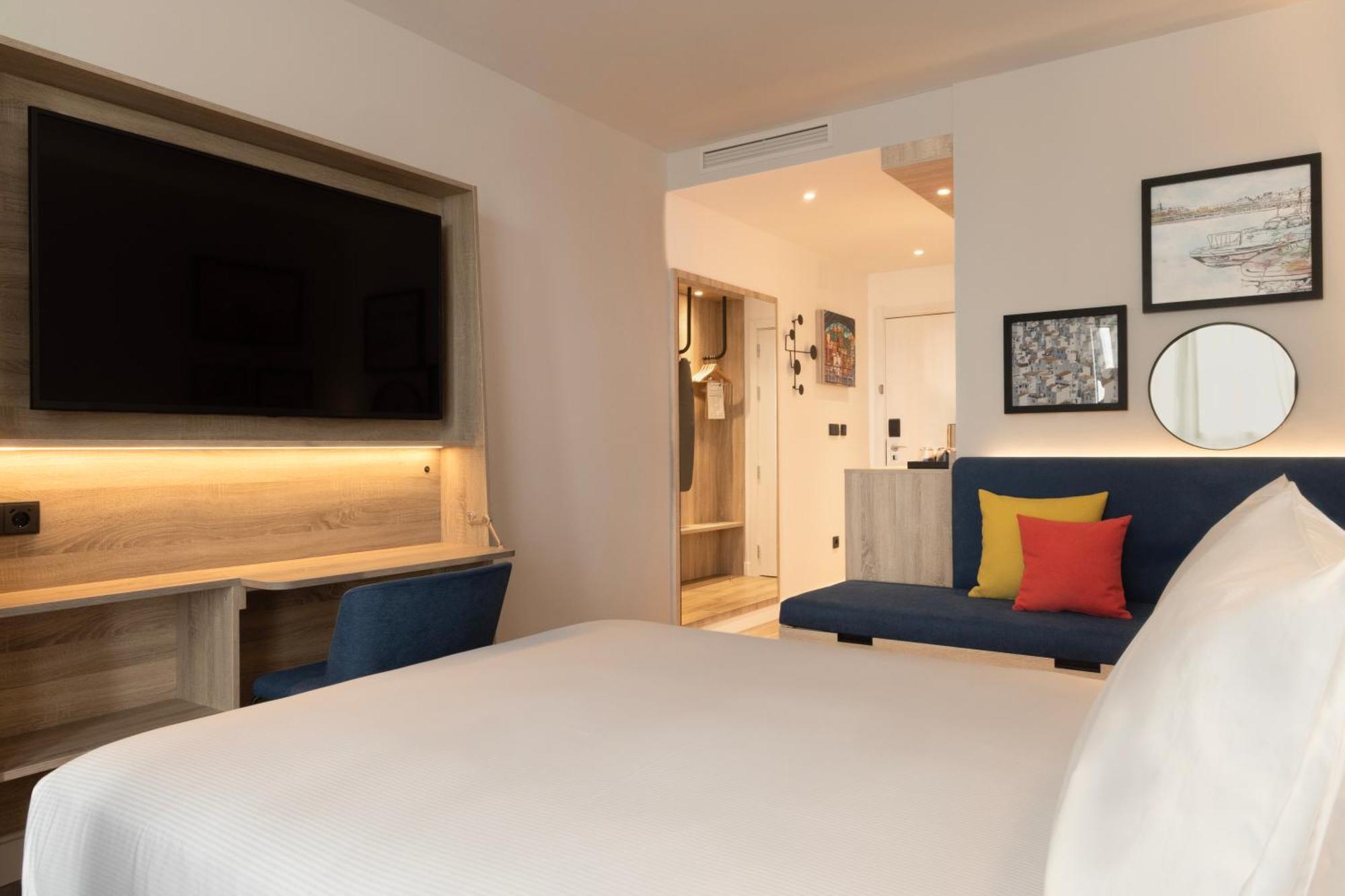 Kamer met Queensize Bed en Slaapbank