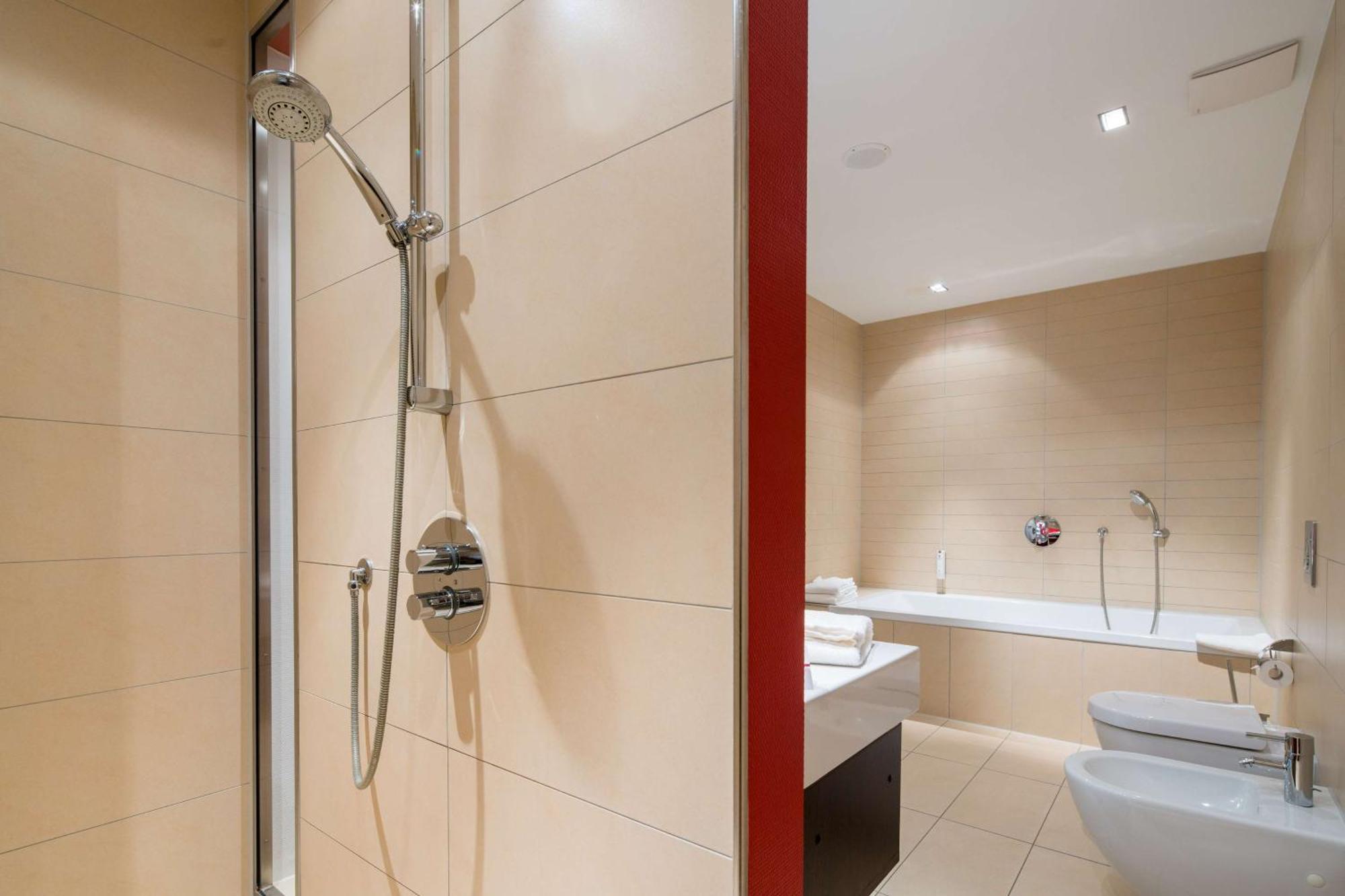 Suite met 2 Eenpersoonsbedden en Slaapbank