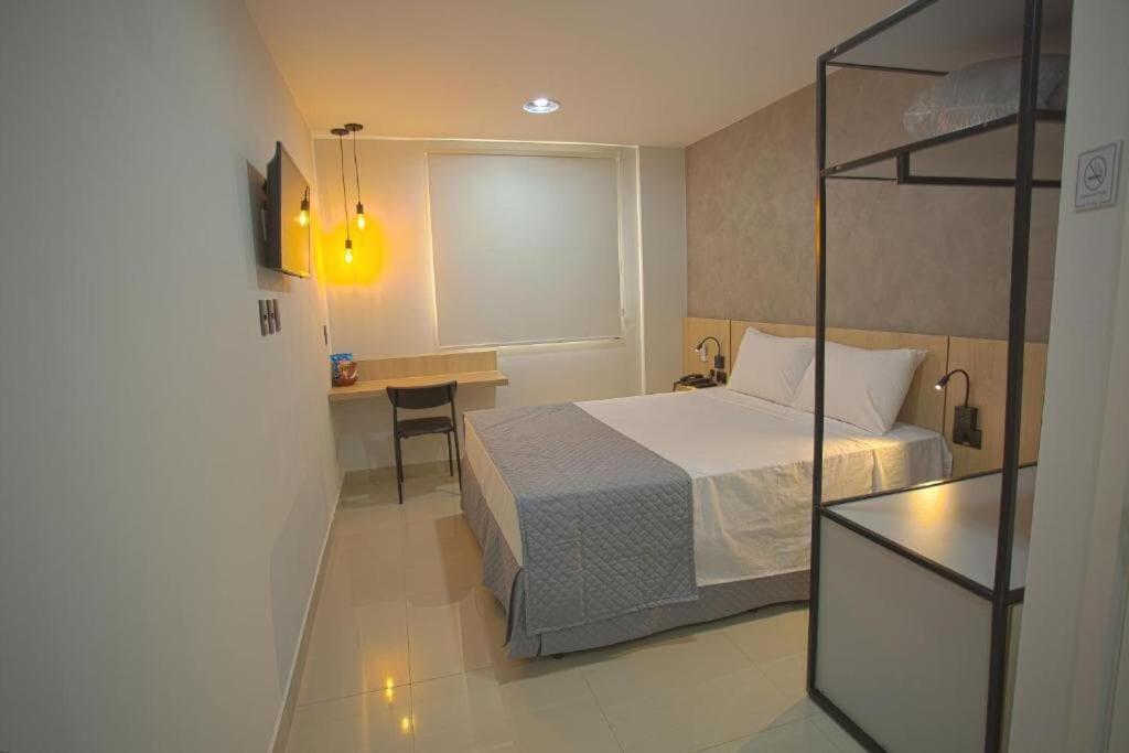 Quarto Individual Econômico