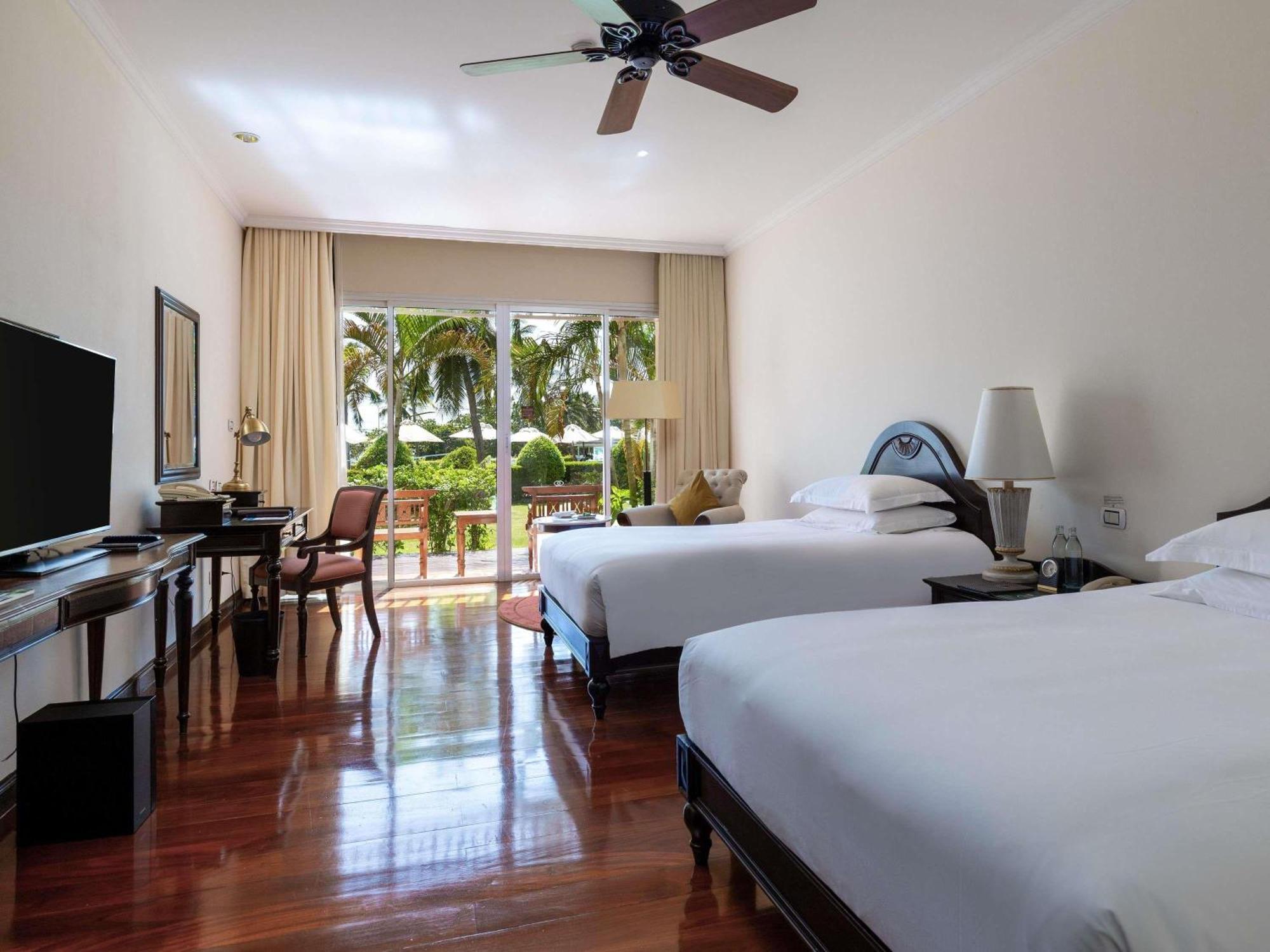 Two-Bedroom Suite One King Bed Two Single Beds Pool Sea View Club Access,1716998201:JPEG