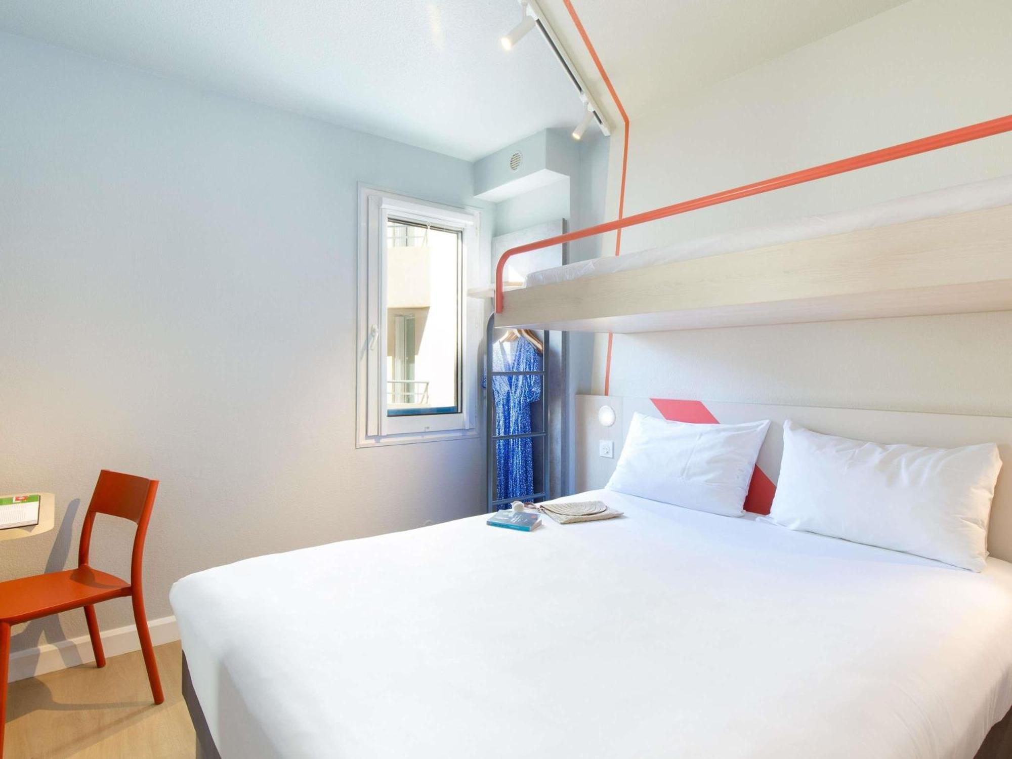 Camera Tripla con 1 Letto Matrimoniale e 1 Letto a Castello
