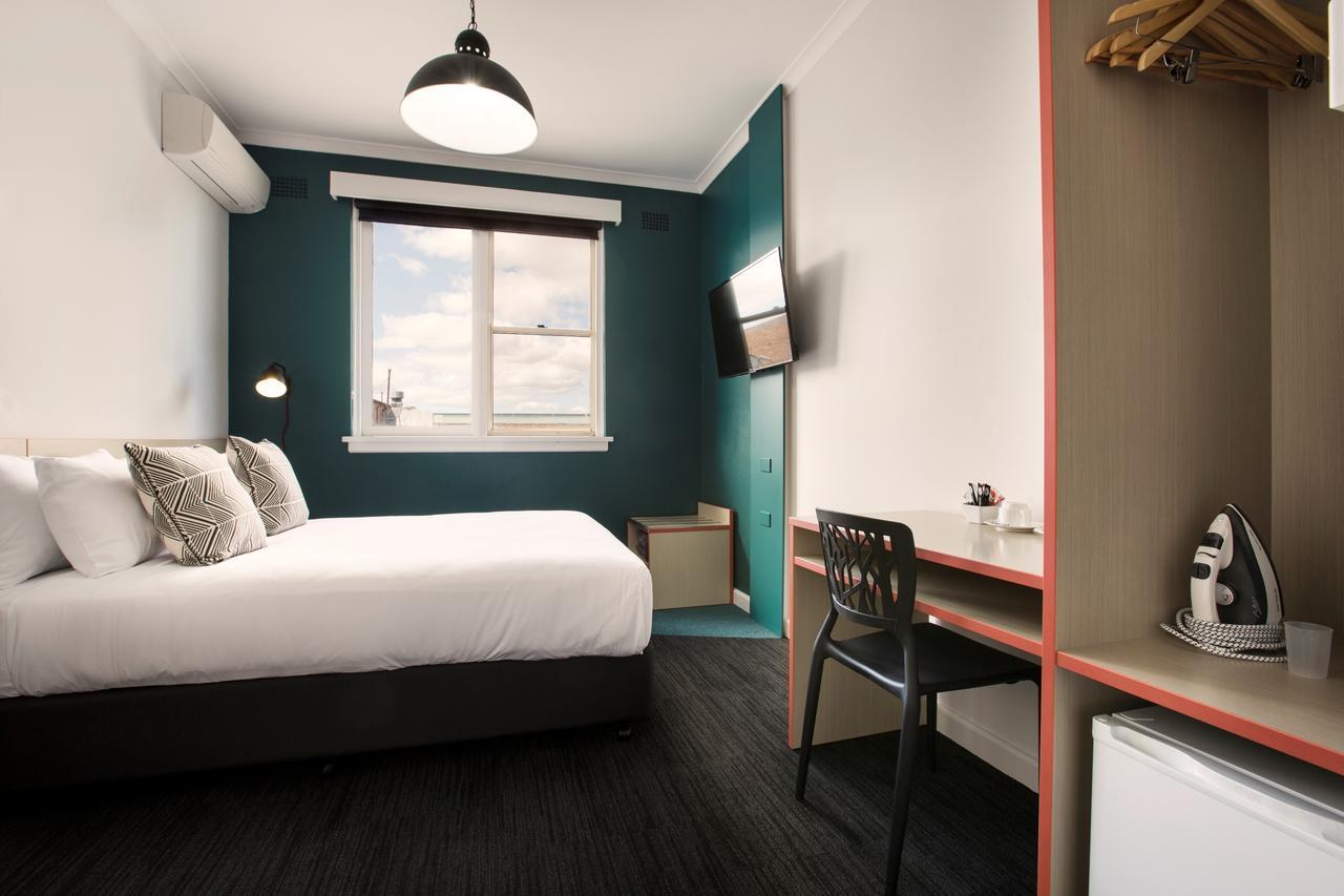 Queen Room with Shared Bathroom