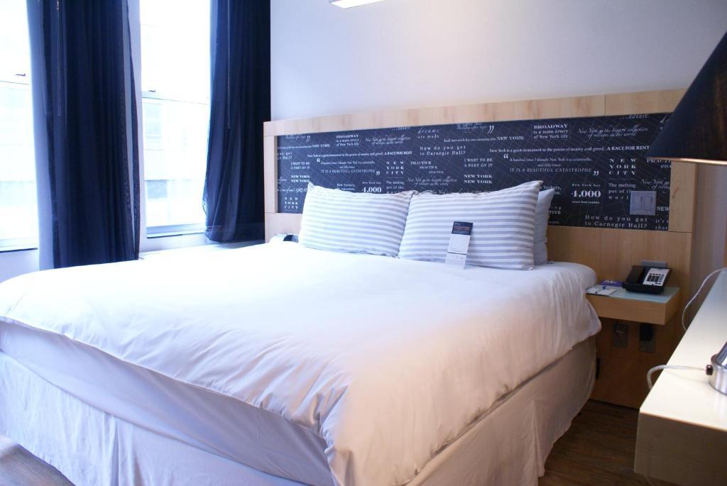 Quarto com Cama Queen-size