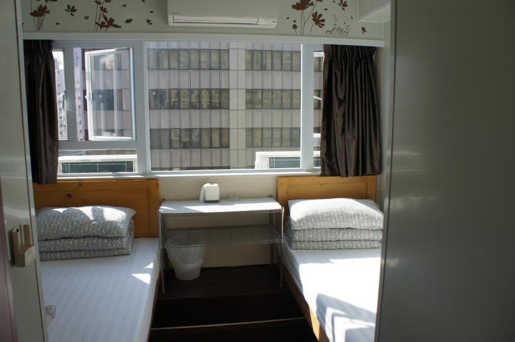 Quarto com 2 Camas de Solteiro