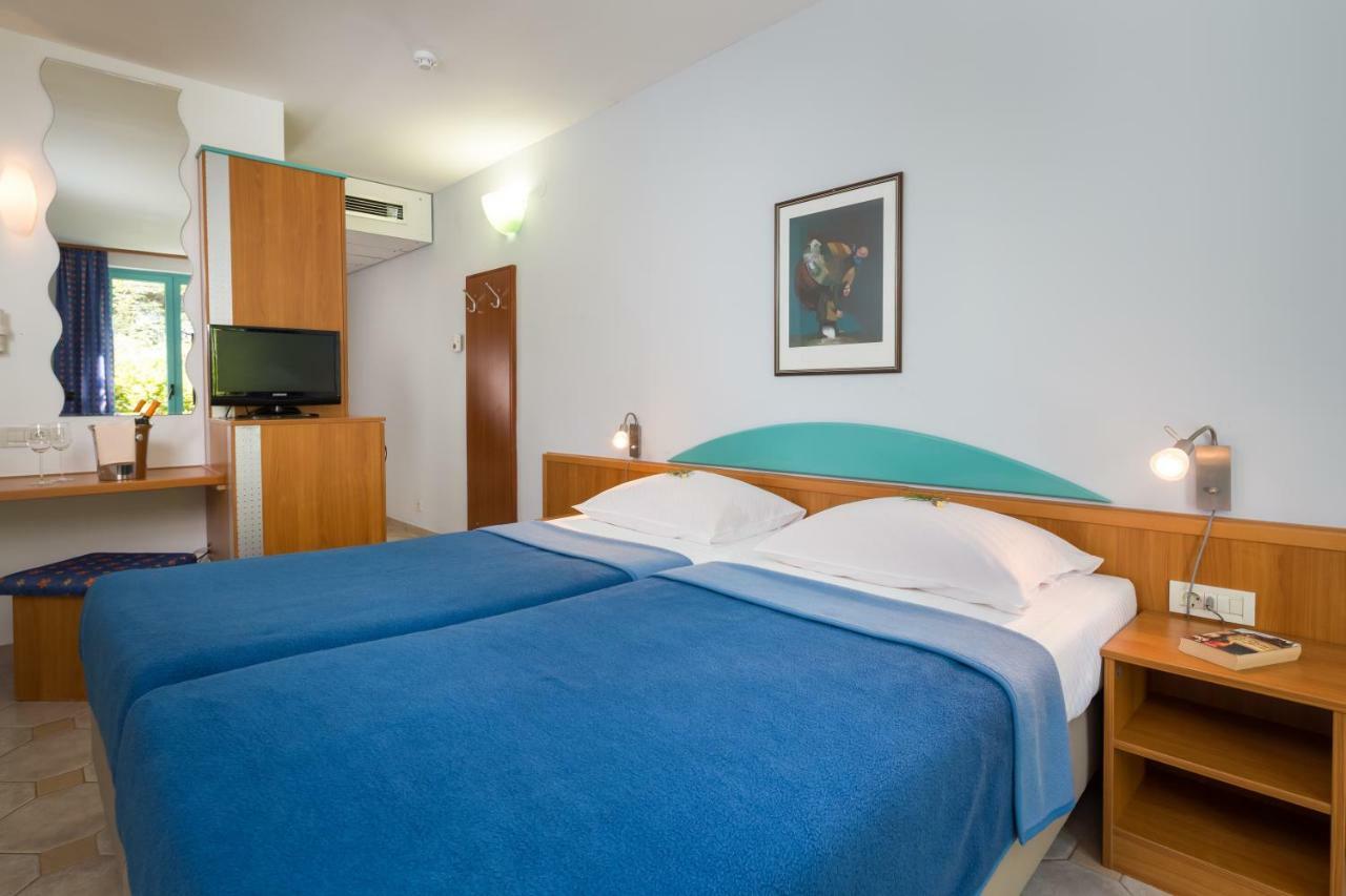 Camera Matrimoniale/Doppia con Letti Singoli con Letto Supplementare